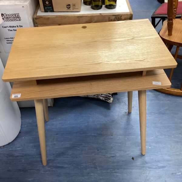 Light wood habitat desk with simple modern design.