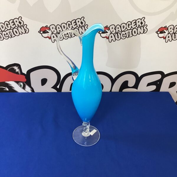 Vintage Murano glass carafe in vibrant blue.