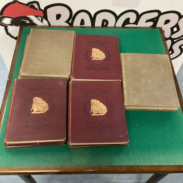 Collection of antique Punch annuals from 1877-1917, Victorian era.