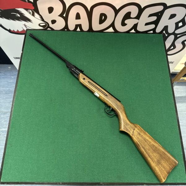 Side view of a vintage Diana C22 .177 air rifle.