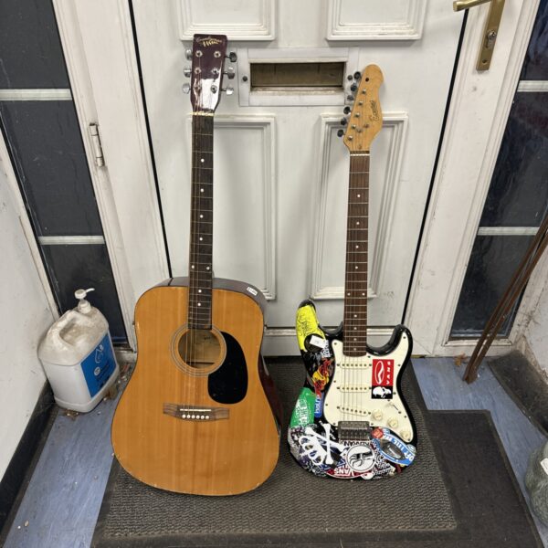 Acoustic and electric guitar lot featuring Encore and countryman brands.