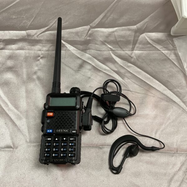 Cynic UV-5F walkie talkie with antenna and push-to-talk button.