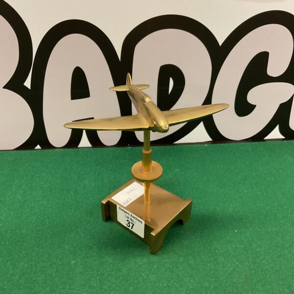 Vintage brass WWII Spitfire model, a unique collectible aircraft.