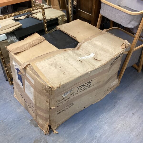 Original Sabichi BBQ grill in unopened packaging for outdoor cooking.
