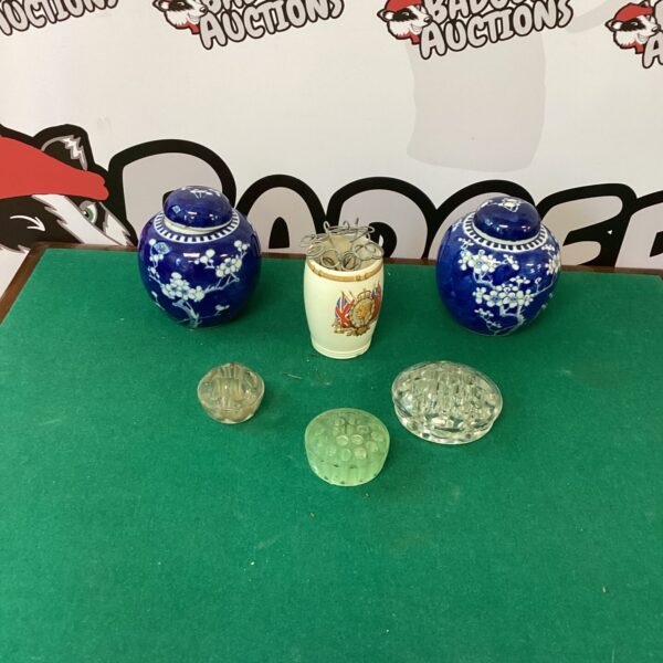 Vintage China ginger jars and posy holders with floral designs.