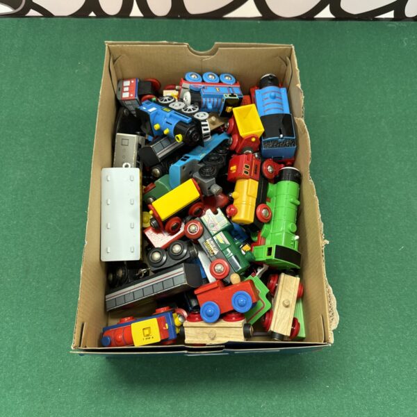 Colourful Brio toy train set and wooden railway carriages.