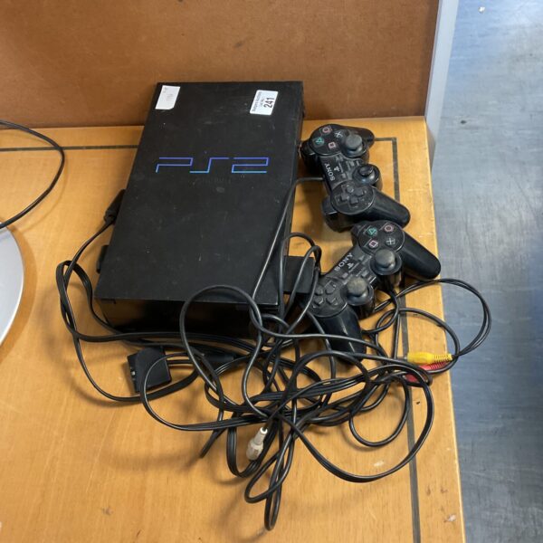 Sony Playstation 2 console with controllers and leads for retro gaming.