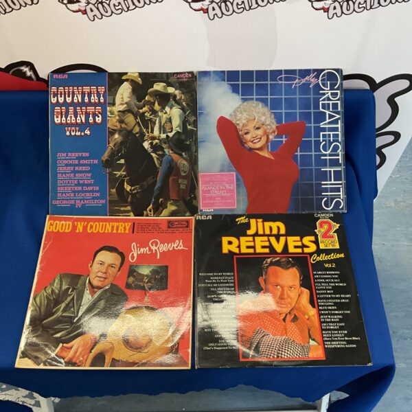 Vintage Country vinyl records lot featuring Dolly Parton and Jim Reeves.