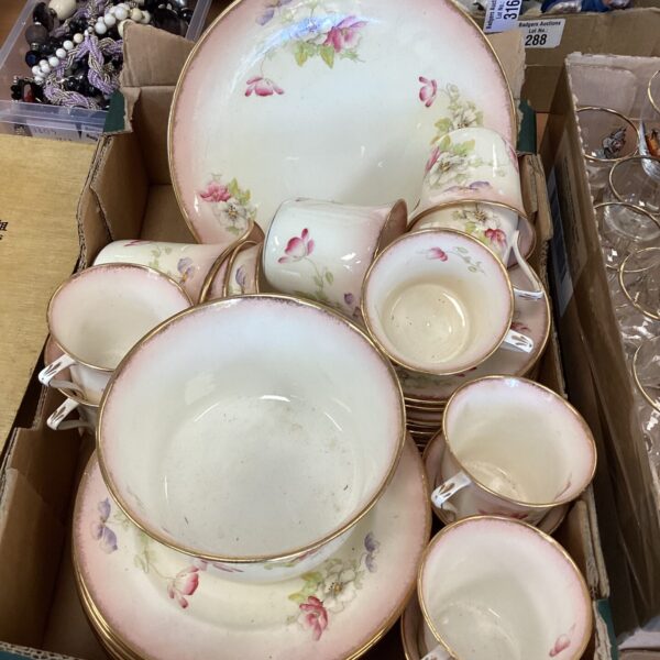 Antique Diamond & Co bone china tea set with floral design.