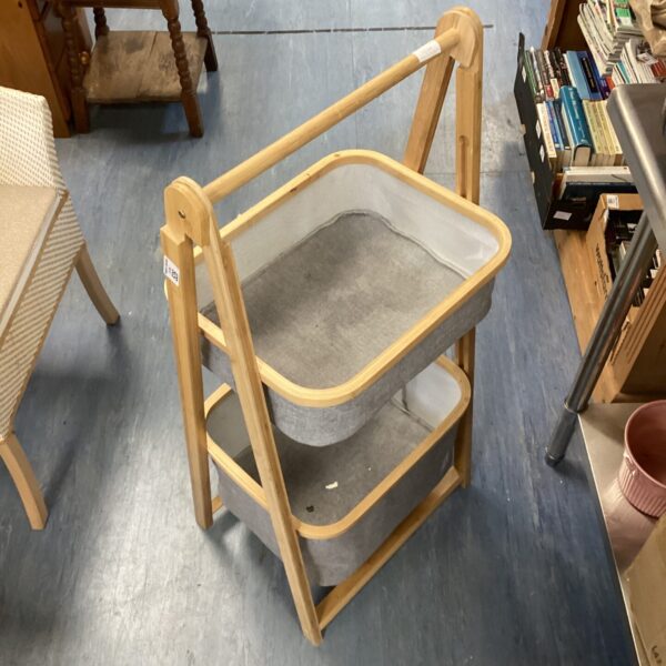 Front view of a bamboo basket unit with fabric liner.
