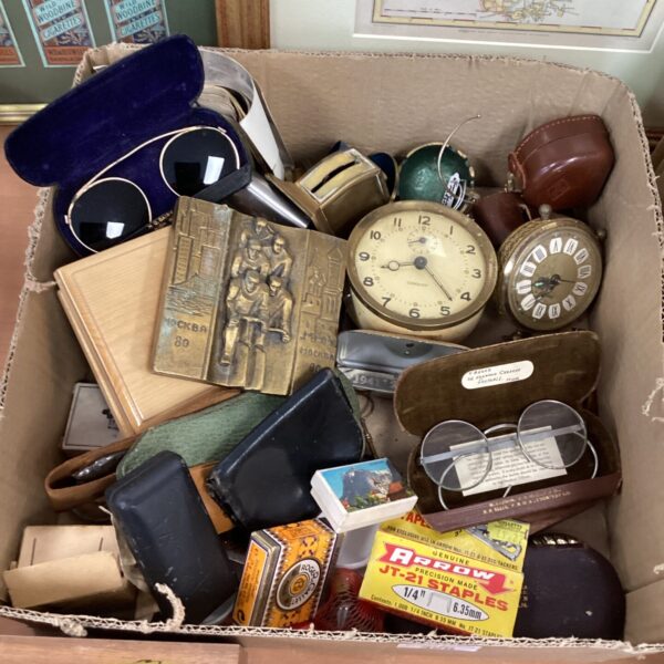 Vintage mixed lot with ephemera, sunglasses, and clock.