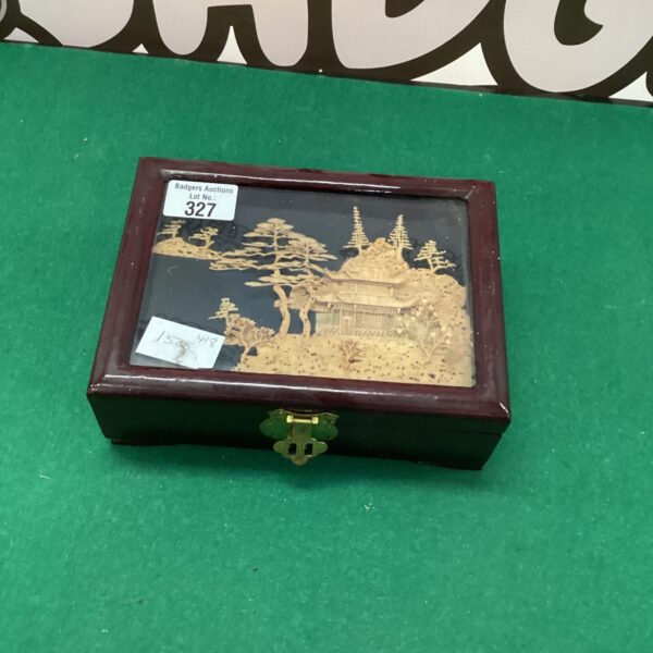 Intricate carving on a vintage Asian jewellery box.