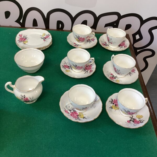 Vintage Royal Vale bone china tea set with floral design.