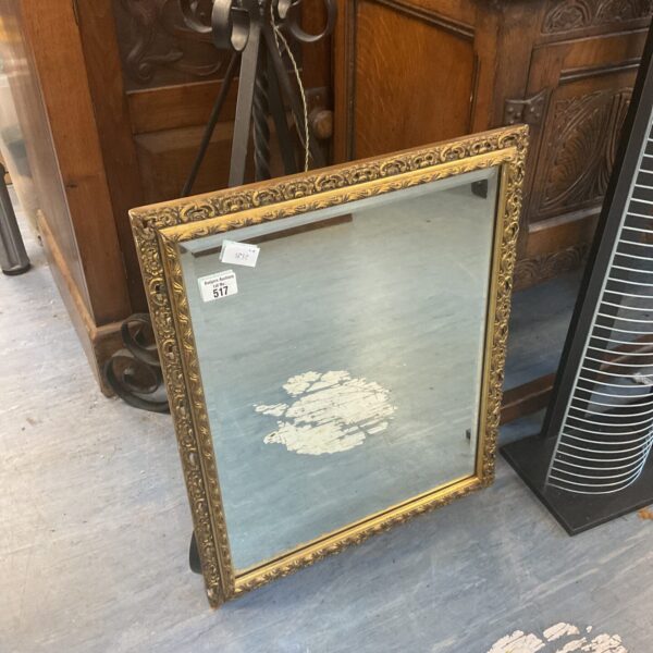 Antique French style gilt mirror with bevelled edge.