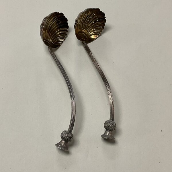 Antique Scottish thistle sugar sifter and serving spoon set.
