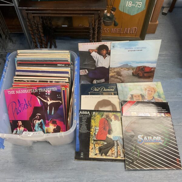 A lot of twelve vinyl records including Abba and Simon & Garfunkel.