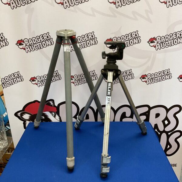 Two tripods, a Slik camera tripod and a Rotax surveyor tripod.