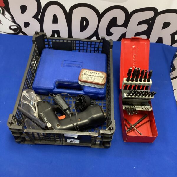 Cordless drill set with various drill bits for DIY projects.
