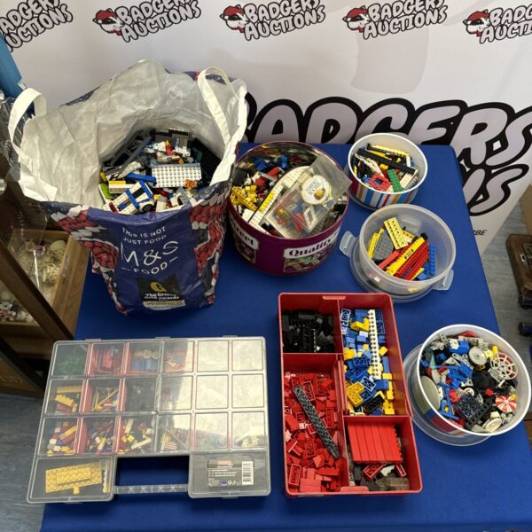 Large bulk lot of vintage Lego bricks for collectors.