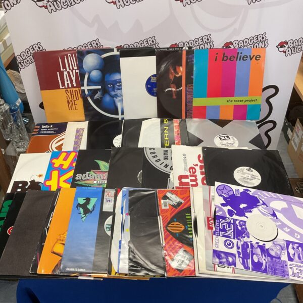 Lot of 1990s dance music vinyl records, house and techno classics.