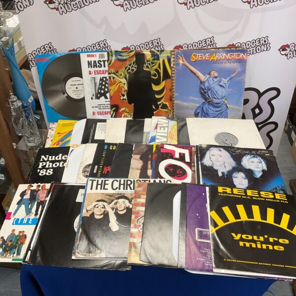 Large lot of 1980s vinyl records, including disco and house music.