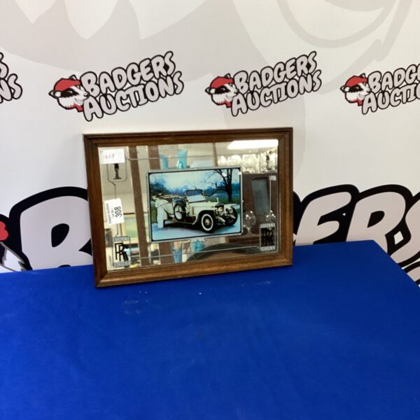 Framed vintage mirror depicting a classic Rolls Royce automobile.