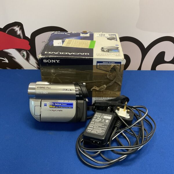 Sony DCR-DVD450E camcorder with accessories, vintage digital video camera.