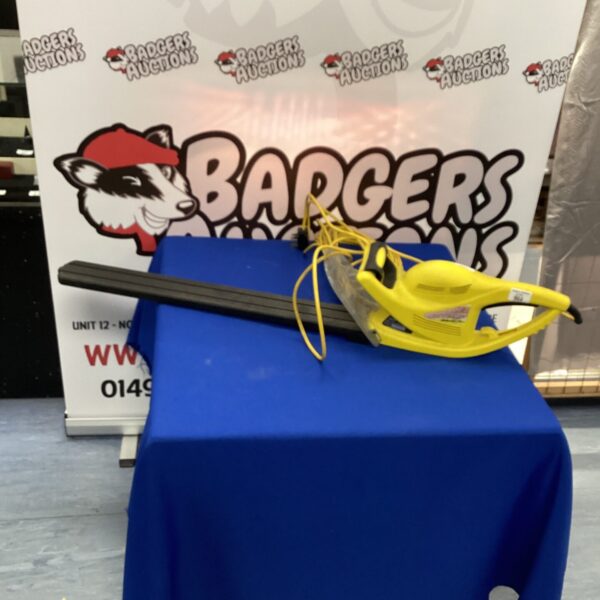 McCulloch electric hedge trimmer for garden maintenance.
