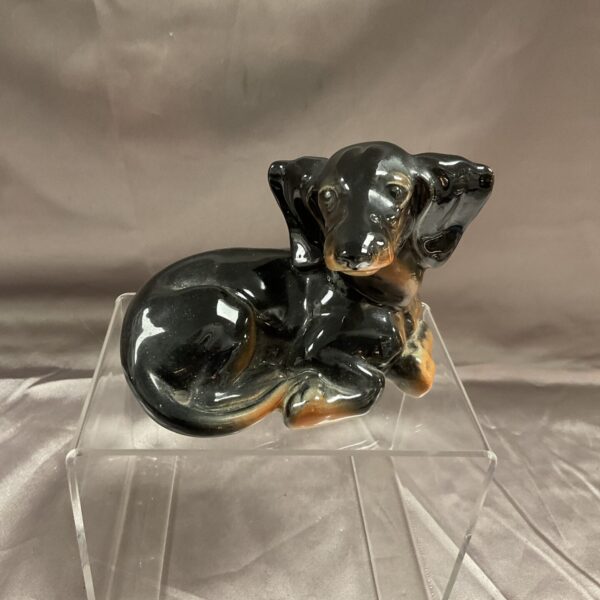Vintage Sylvia ceramic dachshund figure, glossy black glaze.