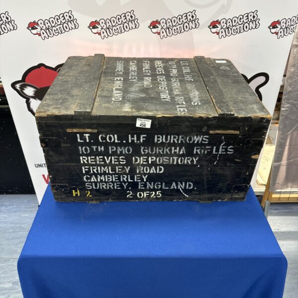 Front view of a vintage wooden Gurkhas storage box.