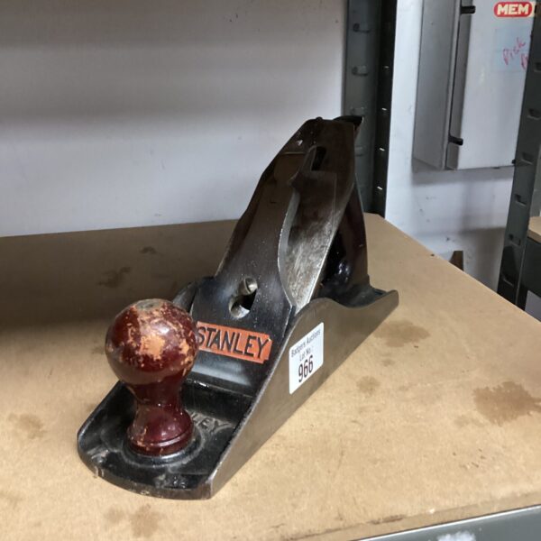 Vintage Stanley No. 606 wood plane with wooden handle.