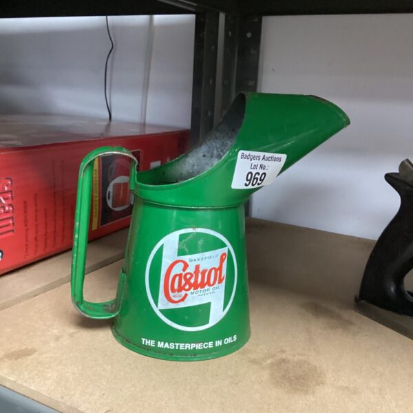 Vintage green Castrol oil can, collectible automotive memorabilia.