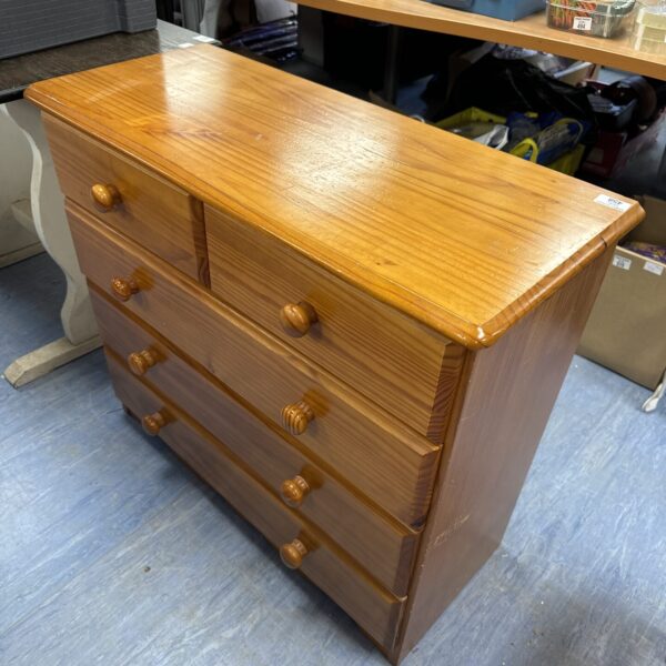 Vintage pine chest of drawers with two over three drawers.