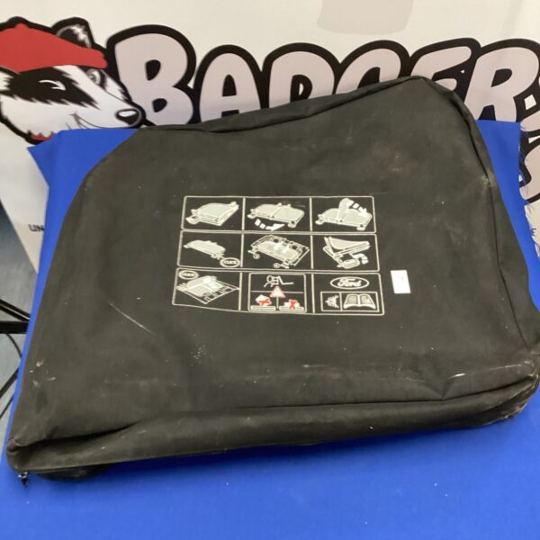 Vintage Ford convertible rear seat cover, a classic car accessory.