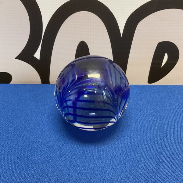 Striking blue swirl Langham glass paperweight, a beautiful collectible art glass piece.
