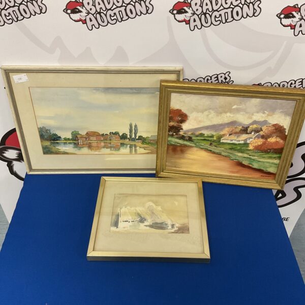 Signed landscape painting featuring a riverside cottage and pond scene.