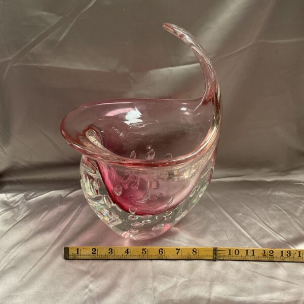Vibrant Murano glass vase with strawberry coloring and bubble details.