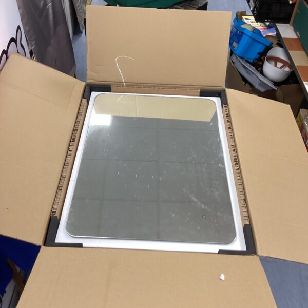 Illuminated bathroom mirror presented as found, ready for restoration.