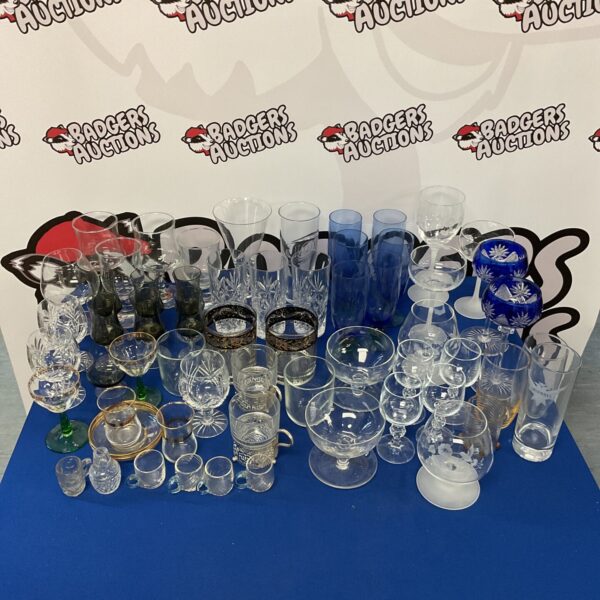 Assorted vintage glassware lot with colourful glasses and tumblers.