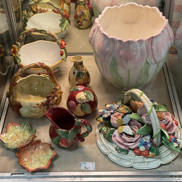 Vibrant Fitz and Floyd majolica china collection with fruit designs.