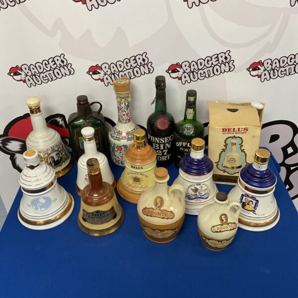 Vintage lot of Bells Whiskey & Port ceramic decanters for collectors.