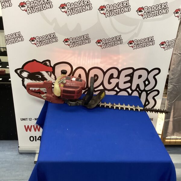 Sovereign petrol hedge cutter for garden landscaping and maintenance.