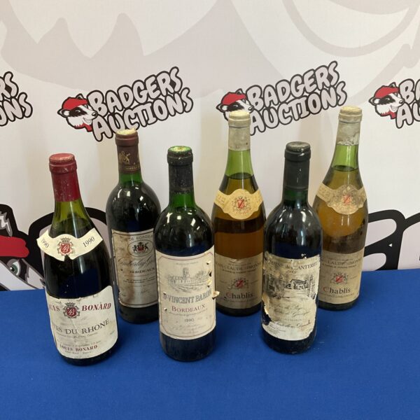 Vintage wine collection featuring Jean Claude Simonnet and St Vincent Baron bottles.