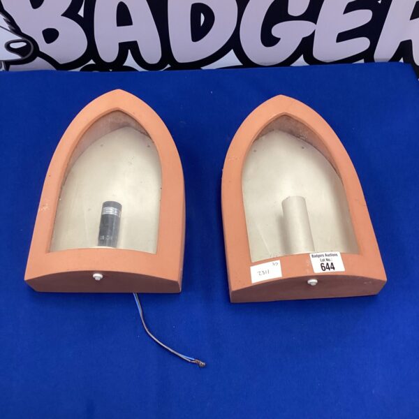 Pair of vintage terracotta wall lights with glass panels.