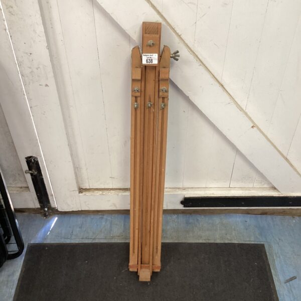 Vintage wooden artist easel, folding studio stand for painting.