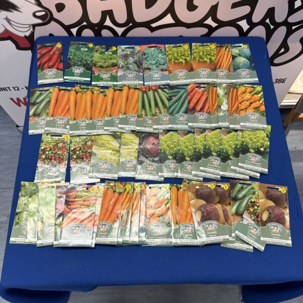 Assorted vegetable seed sachets for gardening and growing produce.