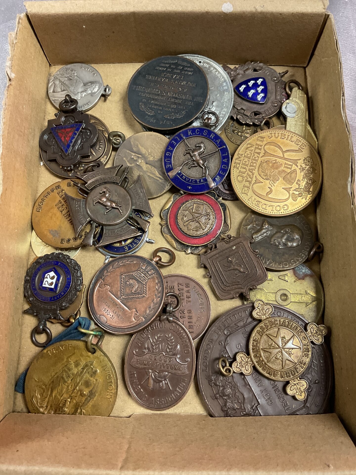 823 Tub of Assorted Medals Inc Shooting Medals