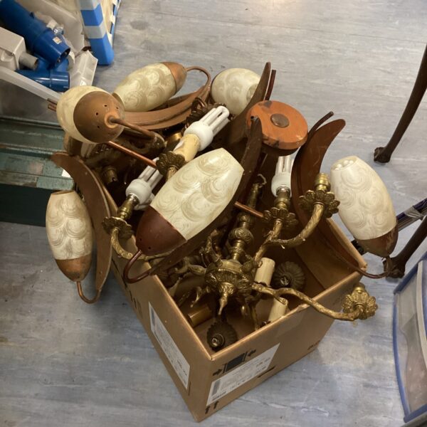 Vintage ceiling light units with brass fittings and glass shades.