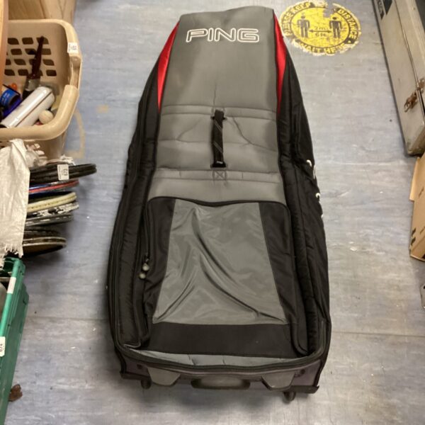 Black Ping golf club transport bag for carrying clubs.