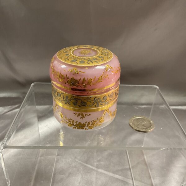 Vintage pink glass pot with gilt decoration, collectible glassware.